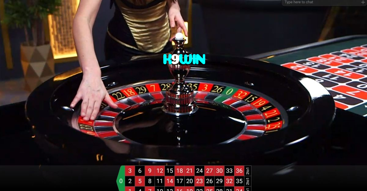 K9WIN casino presented on mobile device in Pakistan with slots and live games