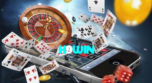 K9WIN casino presented on mobile device in Pakistan with slots and live games